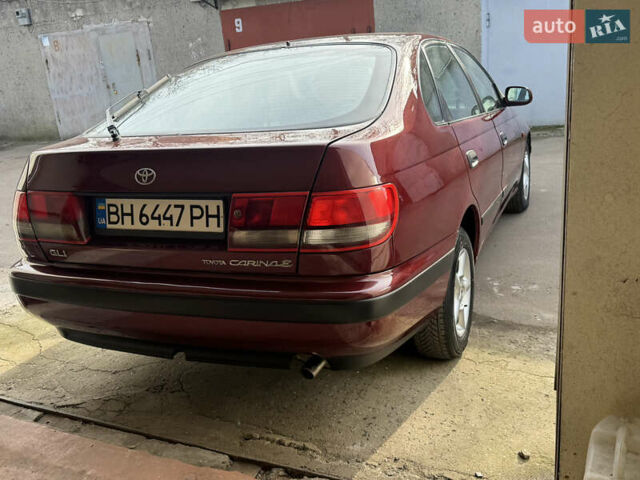 Красный Тойота Карина, объемом двигателя 1.6 л и пробегом 259 тыс. км за 2800 $, фото 5 на Automoto.ua
