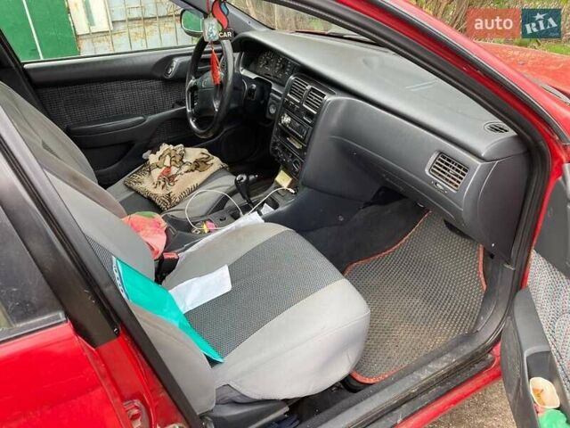 Красный Тойота Карина, объемом двигателя 1.76 л и пробегом 428 тыс. км за 2800 $, фото 6 на Automoto.ua