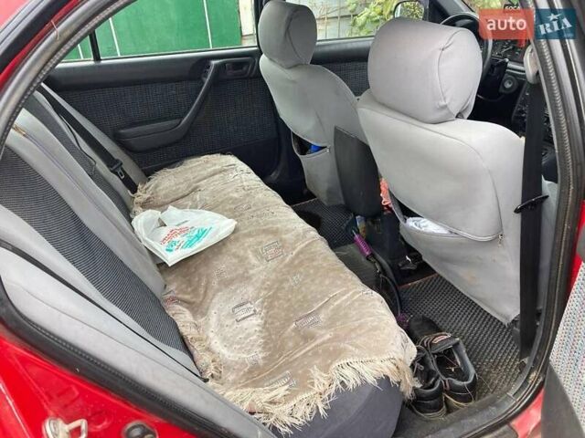 Красный Тойота Карина, объемом двигателя 1.76 л и пробегом 428 тыс. км за 2800 $, фото 10 на Automoto.ua