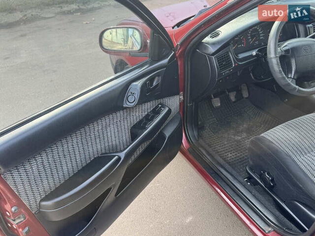 Красный Тойота Карина, объемом двигателя 1.6 л и пробегом 259 тыс. км за 2800 $, фото 9 на Automoto.ua