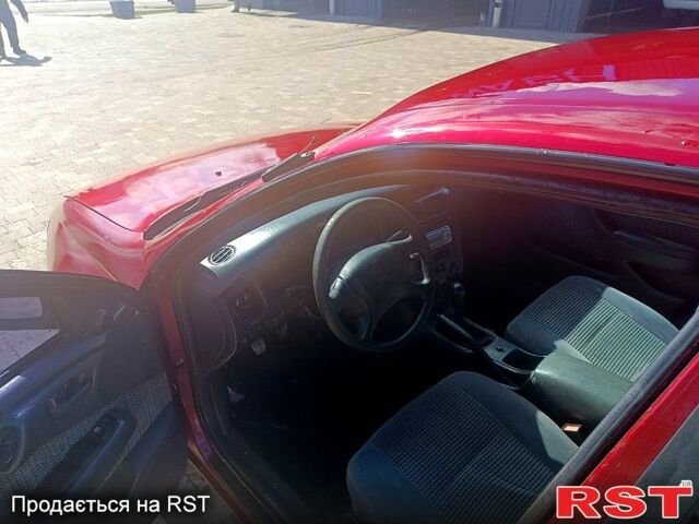 Червоний Тойота Каріна, об'ємом двигуна 1.8 л та пробігом 0 тис. км за 1970 $, фото 6 на Automoto.ua