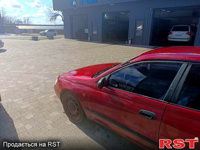 Червоний Тойота Каріна, об'ємом двигуна 1.8 л та пробігом 0 тис. км за 1970 $, фото 5 на Automoto.ua