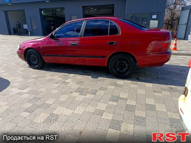 Червоний Тойота Каріна, об'ємом двигуна 1.8 л та пробігом 0 тис. км за 1970 $, фото 1 на Automoto.ua