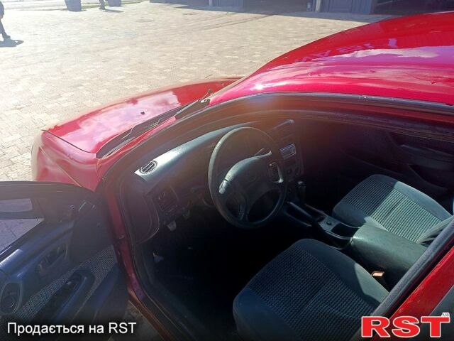 Червоний Тойота Каріна, об'ємом двигуна 1.8 л та пробігом 0 тис. км за 1970 $, фото 7 на Automoto.ua