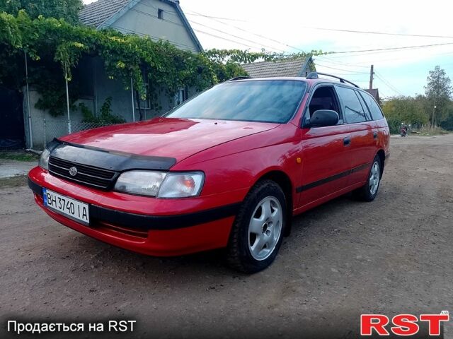 Червоний Тойота Каріна, об'ємом двигуна 1.6 л та пробігом 111 тис. км за 1999 $, фото 3 на Automoto.ua