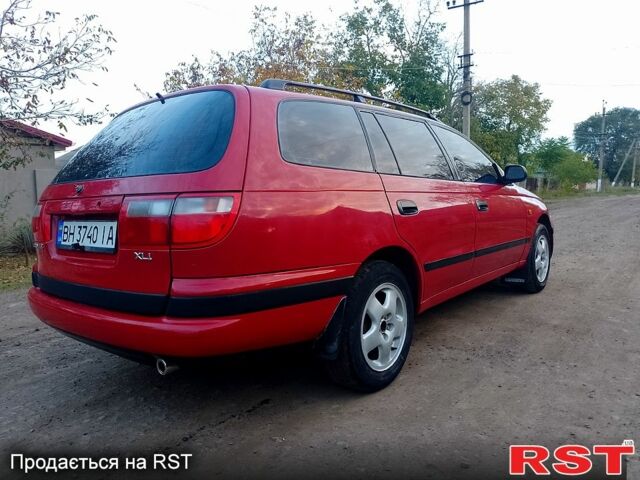 Червоний Тойота Каріна, об'ємом двигуна 1.6 л та пробігом 111 тис. км за 1999 $, фото 6 на Automoto.ua