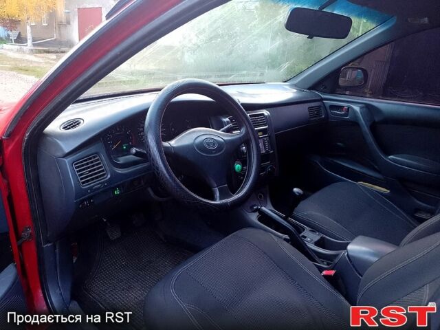 Червоний Тойота Каріна, об'ємом двигуна 1.6 л та пробігом 111 тис. км за 1999 $, фото 5 на Automoto.ua
