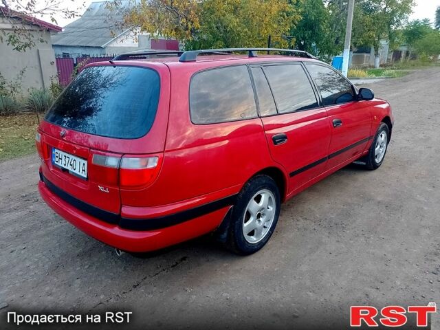 Червоний Тойота Каріна, об'ємом двигуна 1.6 л та пробігом 111 тис. км за 1999 $, фото 8 на Automoto.ua