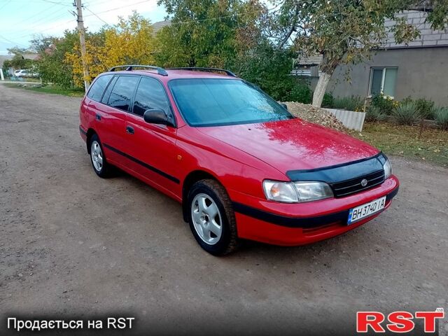 Червоний Тойота Каріна, об'ємом двигуна 1.6 л та пробігом 111 тис. км за 1999 $, фото 2 на Automoto.ua