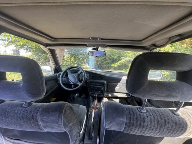 Червоний Тойота Каріна, об'ємом двигуна 1.6 л та пробігом 64 тис. км за 800 $, фото 7 на Automoto.ua