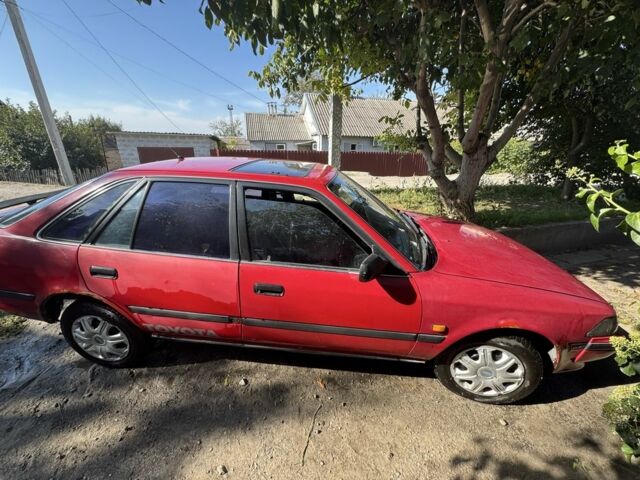 Червоний Тойота Каріна, об'ємом двигуна 1.6 л та пробігом 64 тис. км за 800 $, фото 1 на Automoto.ua