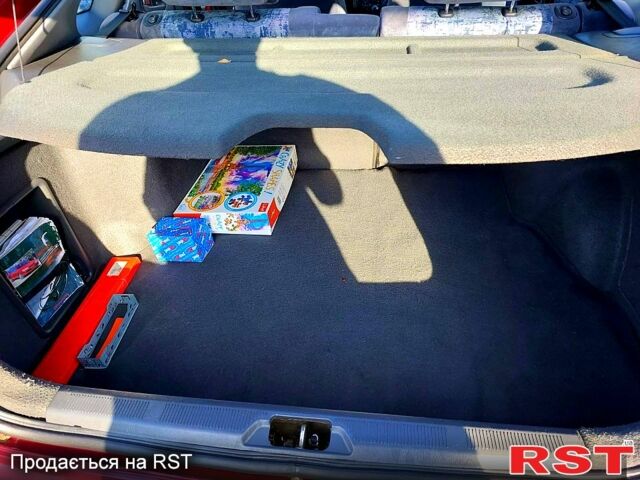 Красный Тойота Карина, объемом двигателя 1.8 л и пробегом 344 тыс. км за 3100 $, фото 9 на Automoto.ua