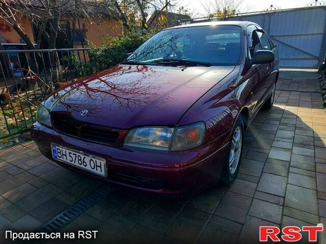 Красный Тойота Карина, объемом двигателя 1.8 л и пробегом 344 тыс. км за 3100 $, фото 12 на Automoto.ua