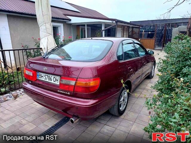 Красный Тойота Карина, объемом двигателя 1.8 л и пробегом 344 тыс. км за 3100 $, фото 10 на Automoto.ua