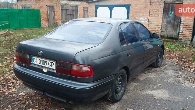 Тойота Карина, объемом двигателя 2 л и пробегом 420 тыс. км за 2000 $, фото 1 на Automoto.ua