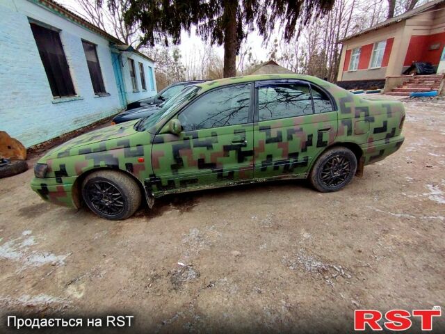 Тойота Карина, объемом двигателя 1.8 л и пробегом 150 тыс. км за 2100 $, фото 2 на Automoto.ua