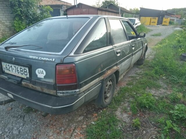 Серый Тойота Карина, объемом двигателя 2 л и пробегом 437 тыс. км за 721 $, фото 4 на Automoto.ua