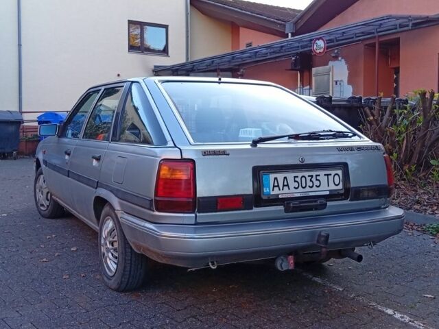 Сірий Тойота Каріна, об'ємом двигуна 2 л та пробігом 236 тис. км за 2638 $, фото 2 на Automoto.ua