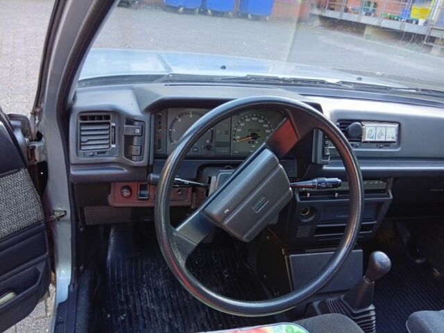 Сірий Тойота Каріна, об'ємом двигуна 2 л та пробігом 236 тис. км за 2638 $, фото 4 на Automoto.ua