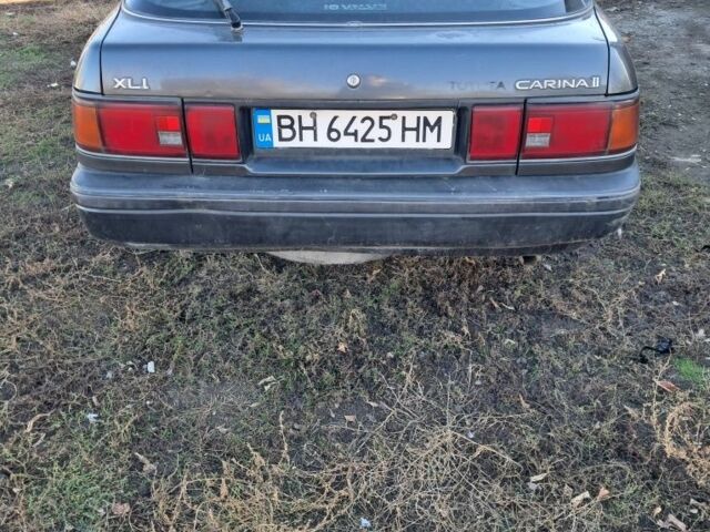 Серый Тойота Карина, объемом двигателя 1.6 л и пробегом 2 тыс. км за 800 $, фото 2 на Automoto.ua