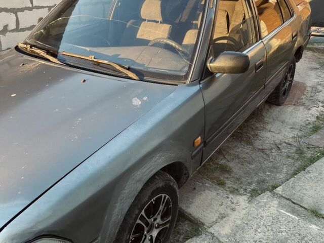 Серый Тойота Карина, объемом двигателя 1.6 л и пробегом 500 тыс. км за 600 $, фото 3 на Automoto.ua