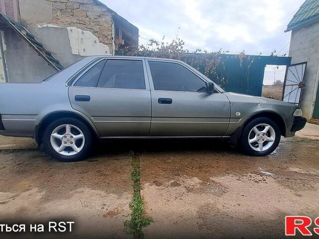 Серый Тойота Карина, объемом двигателя 2 л и пробегом 268 тыс. км за 2300 $, фото 8 на Automoto.ua