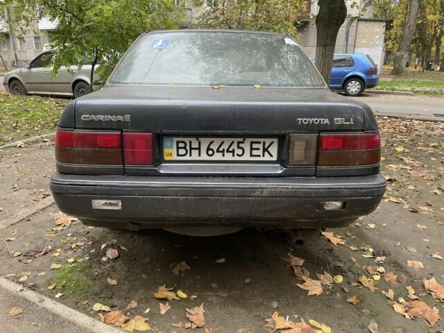 Серый Тойота Карина, объемом двигателя 1.6 л и пробегом 180 тыс. км за 700 $, фото 2 на Automoto.ua