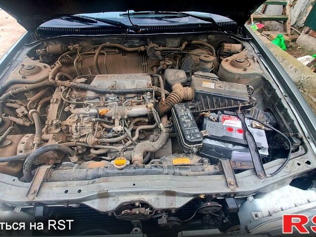 Серый Тойота Карина, объемом двигателя 2 л и пробегом 268 тыс. км за 2300 $, фото 7 на Automoto.ua