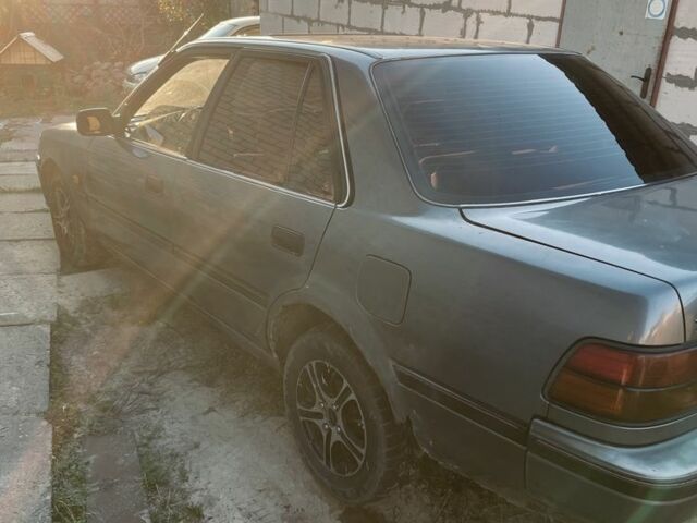 Серый Тойота Карина, объемом двигателя 1.6 л и пробегом 500 тыс. км за 600 $, фото 2 на Automoto.ua