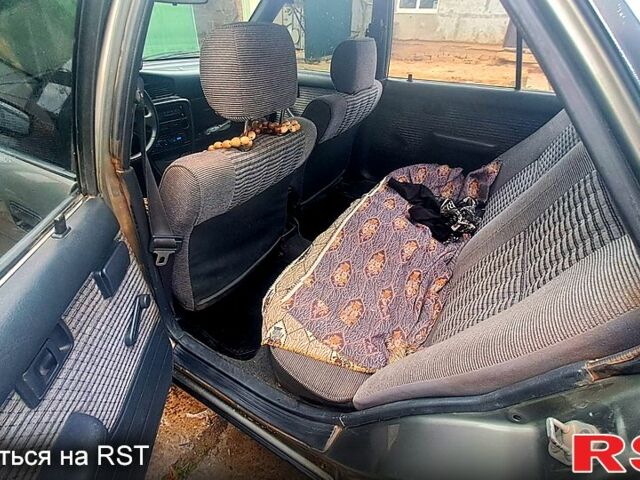 Серый Тойота Карина, объемом двигателя 2 л и пробегом 268 тыс. км за 2300 $, фото 6 на Automoto.ua