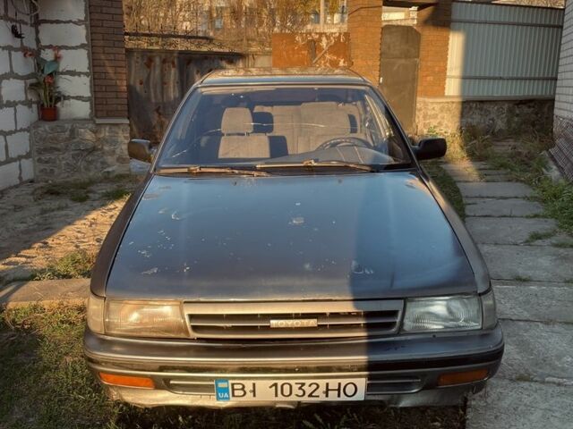 Серый Тойота Карина, объемом двигателя 1.6 л и пробегом 500 тыс. км за 600 $, фото 4 на Automoto.ua