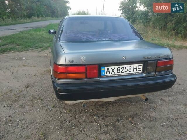 Серый Тойота Карина, объемом двигателя 1.59 л и пробегом 185 тыс. км за 1800 $, фото 2 на Automoto.ua