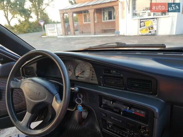 Серый Тойота Карина, объемом двигателя 1.59 л и пробегом 185 тыс. км за 1800 $, фото 7 на Automoto.ua
