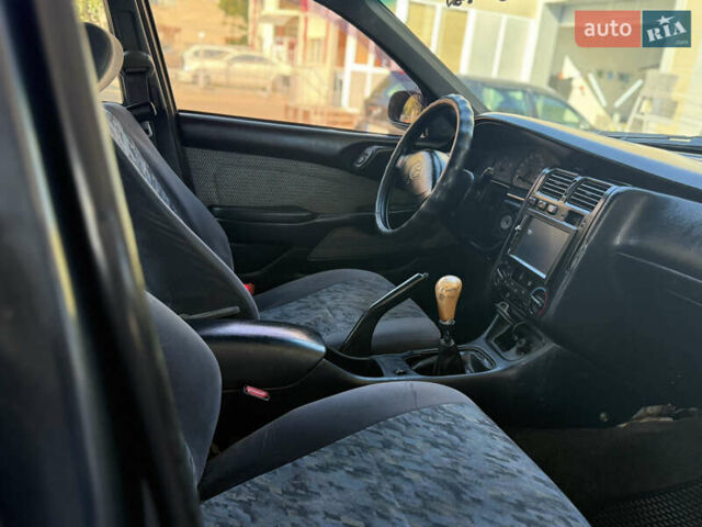 Серый Тойота Карина, объемом двигателя 1.6 л и пробегом 175 тыс. км за 2777 $, фото 10 на Automoto.ua