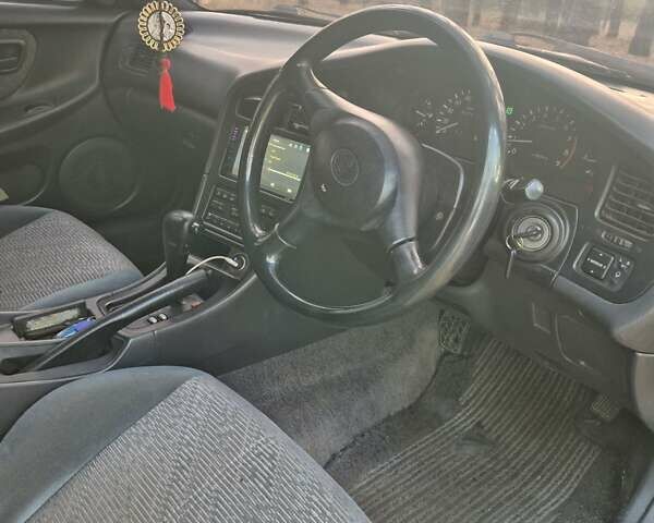 Серый Тойота Карина, объемом двигателя 2 л и пробегом 304 тыс. км за 3000 $, фото 4 на Automoto.ua