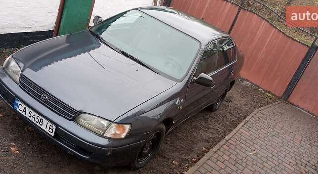 Серый Тойота Карина, объемом двигателя 2 л и пробегом 404 тыс. км за 2999 $, фото 2 на Automoto.ua