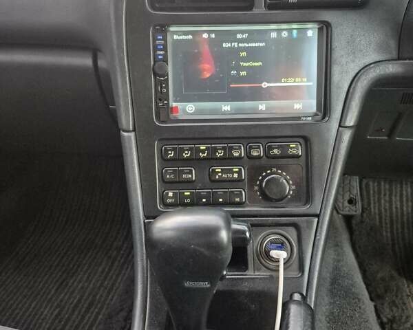 Серый Тойота Карина, объемом двигателя 2 л и пробегом 304 тыс. км за 3000 $, фото 1 на Automoto.ua