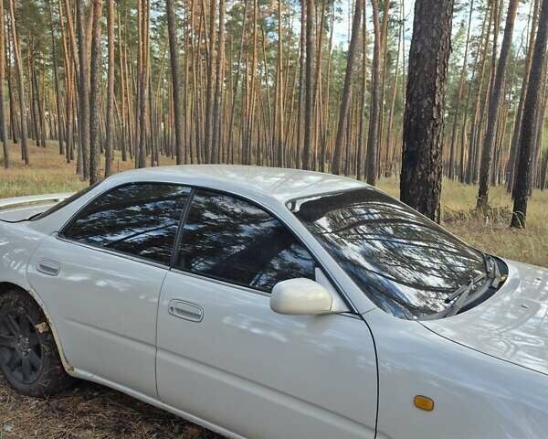 Серый Тойота Карина, объемом двигателя 2 л и пробегом 304 тыс. км за 3000 $, фото 16 на Automoto.ua