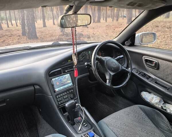 Серый Тойота Карина, объемом двигателя 2 л и пробегом 304 тыс. км за 3000 $, фото 6 на Automoto.ua