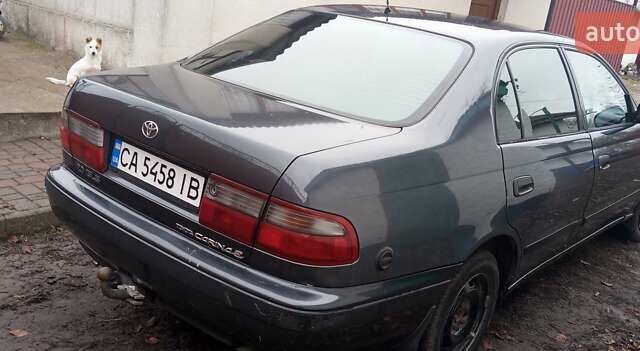 Серый Тойота Карина, объемом двигателя 2 л и пробегом 404 тыс. км за 2999 $, фото 4 на Automoto.ua