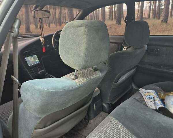 Серый Тойота Карина, объемом двигателя 2 л и пробегом 304 тыс. км за 3000 $, фото 7 на Automoto.ua