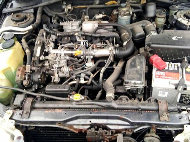 Серый Тойота Карина, объемом двигателя 2 л и пробегом 350 тыс. км за 1300 $, фото 5 на Automoto.ua