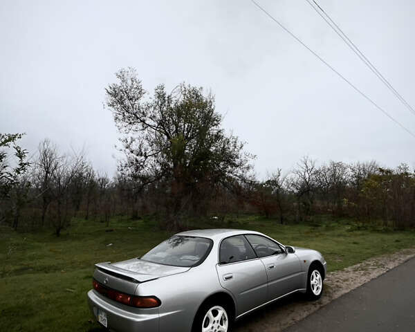 Серый Тойота Карина, объемом двигателя 2 л и пробегом 163 тыс. км за 5000 $, фото 1 на Automoto.ua