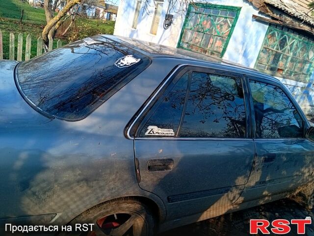 Серый Тойота Карина, объемом двигателя 1.6 л и пробегом 0 тыс. км за 1700 $, фото 1 на Automoto.ua