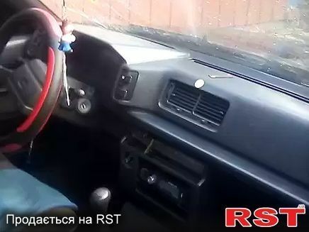 Синий Тойота Карина, объемом двигателя 1 л и пробегом 300 тыс. км за 450 $, фото 4 на Automoto.ua
