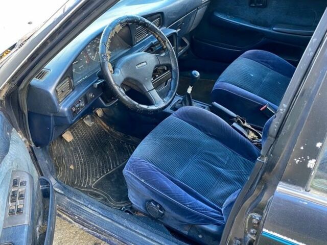 Синий Тойота Карина, объемом двигателя 1.6 л и пробегом 600 тыс. км за 600 $, фото 4 на Automoto.ua