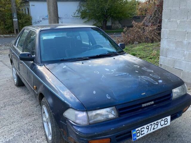 Синий Тойота Карина, объемом двигателя 1.6 л и пробегом 600 тыс. км за 600 $, фото 1 на Automoto.ua