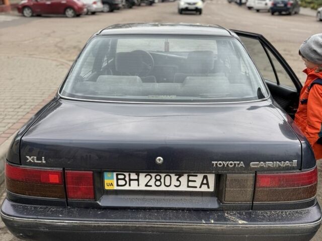 Синій Тойота Каріна, об'ємом двигуна 1.6 л та пробігом 222 тис. км за 1550 $, фото 2 на Automoto.ua