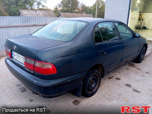 Синій Тойота Каріна, об'ємом двигуна 2 л та пробігом 200 тис. км за 1600 $, фото 4 на Automoto.ua