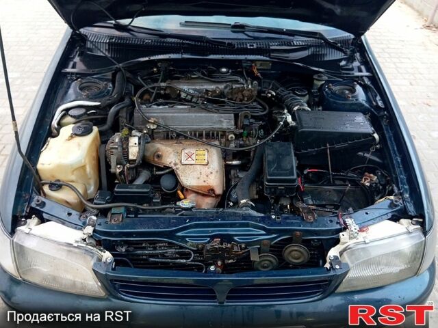 Синій Тойота Каріна, об'ємом двигуна 2 л та пробігом 200 тис. км за 1600 $, фото 8 на Automoto.ua